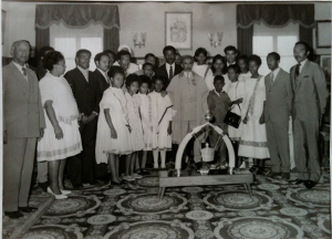 Some of our deaf members, board, executive and parents committee members with 
        HIM in July 1973