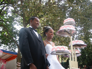 These happy deaf couple were presented with the wedding cake by Mr. Belai Teklu's Pastry House during their wedding on 29 January 2006