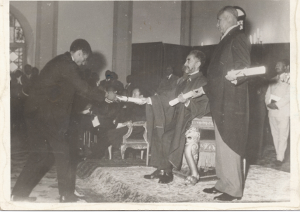 Yohannes Tsegaye receiving his diploma from His Imperial Majesty Haile Selassie I 
          on Hidar 4, 1965 E.C.